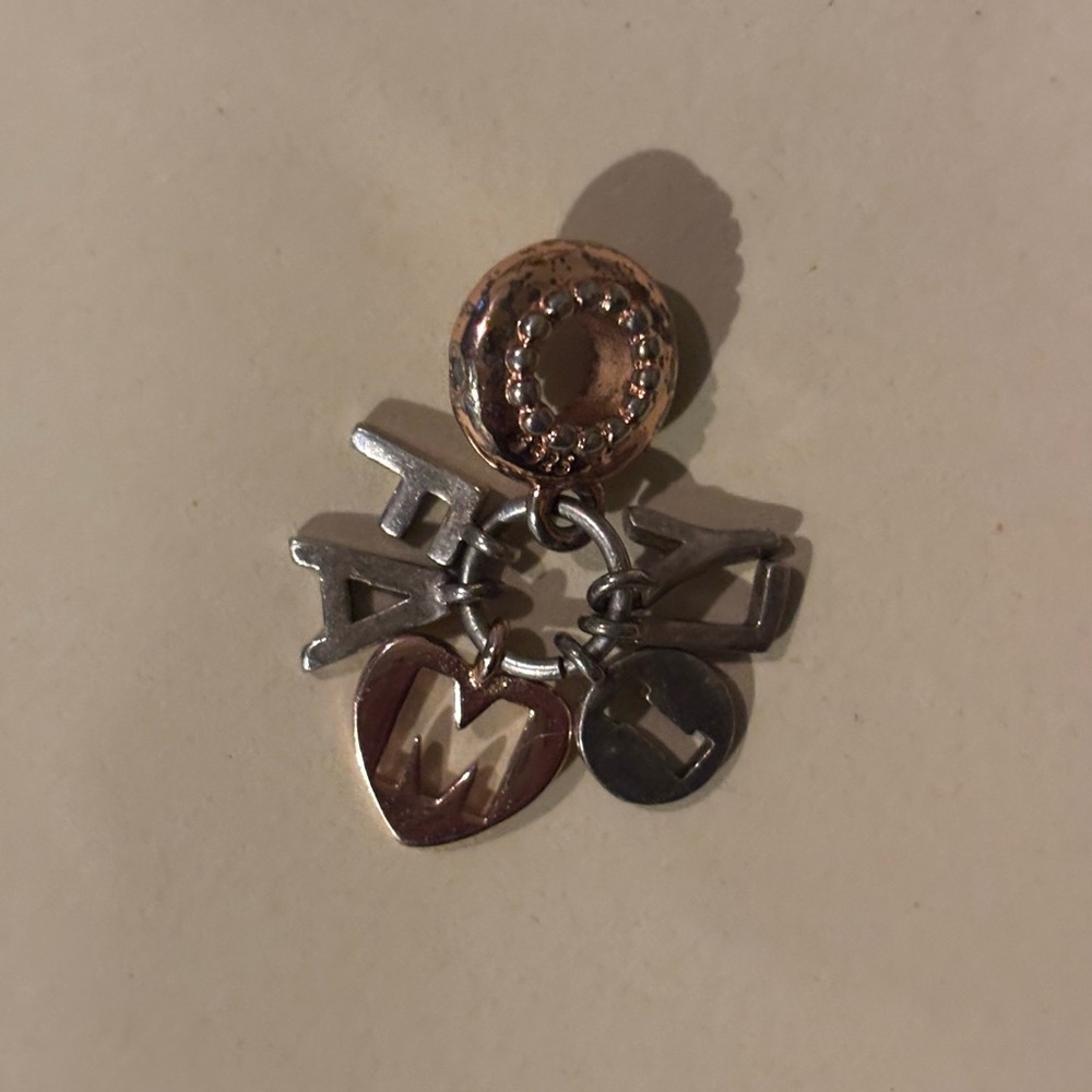 Pandora family dangle charm retired